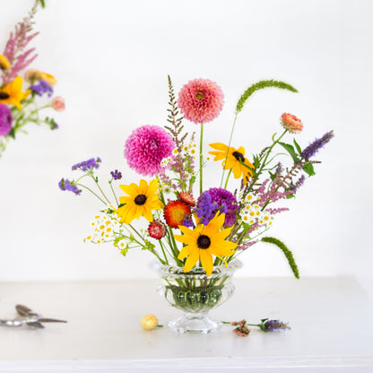 Round pin holder kenzan flower frog in a vase with flowers 